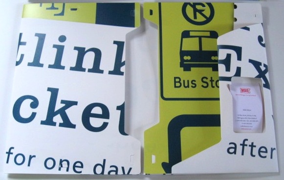 A recycled poster folder made from a GWRC campaign for Metlink.
